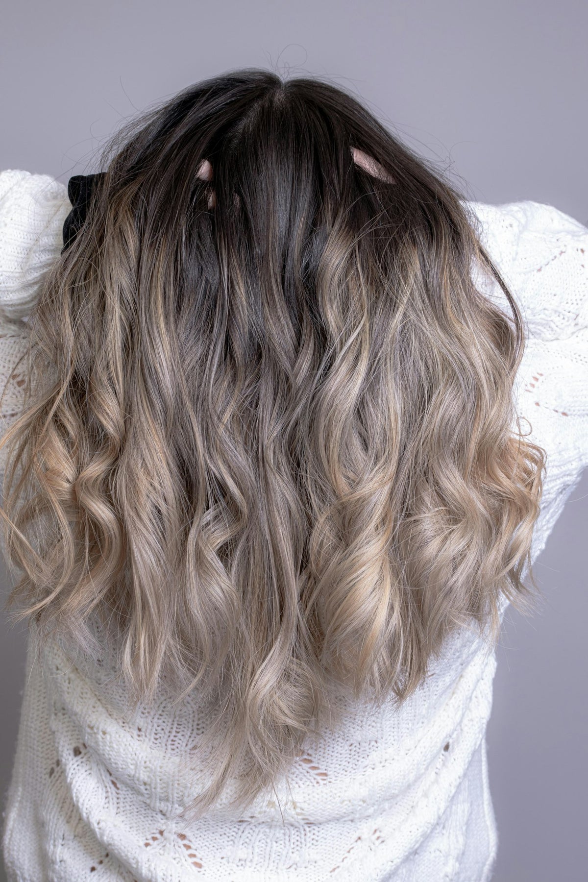 Blonde halo hair extension worn long
