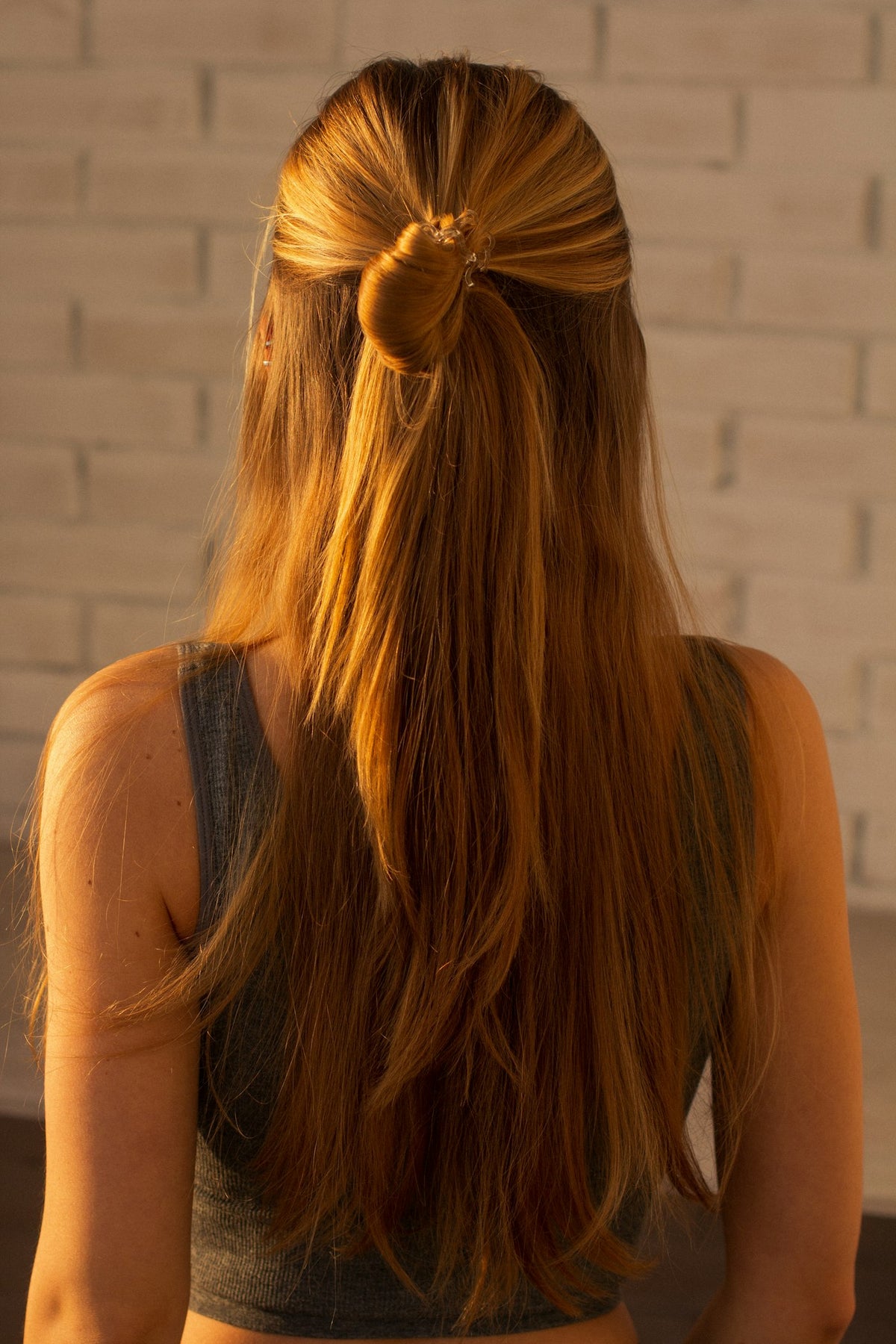 Wrap-around ponytail hair extension in brown